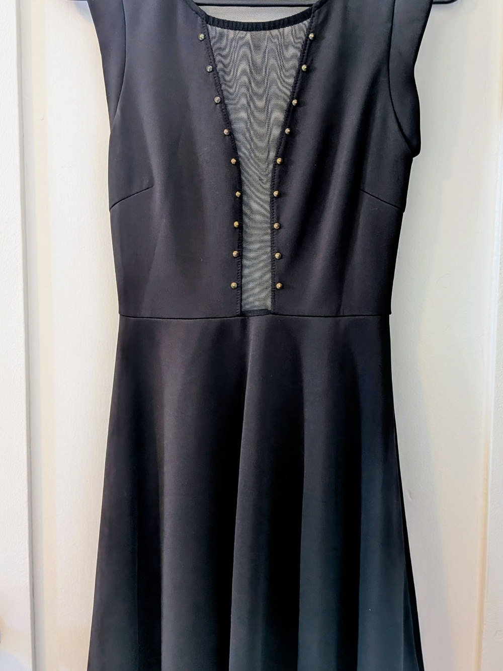 Mystic Black Sleeveless Dress with Sheer V-Panel and Stud Trim